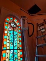 Honey Bees Flying to the Stained Glass Window of a Columbus Georgia Church During Removal of the Hive